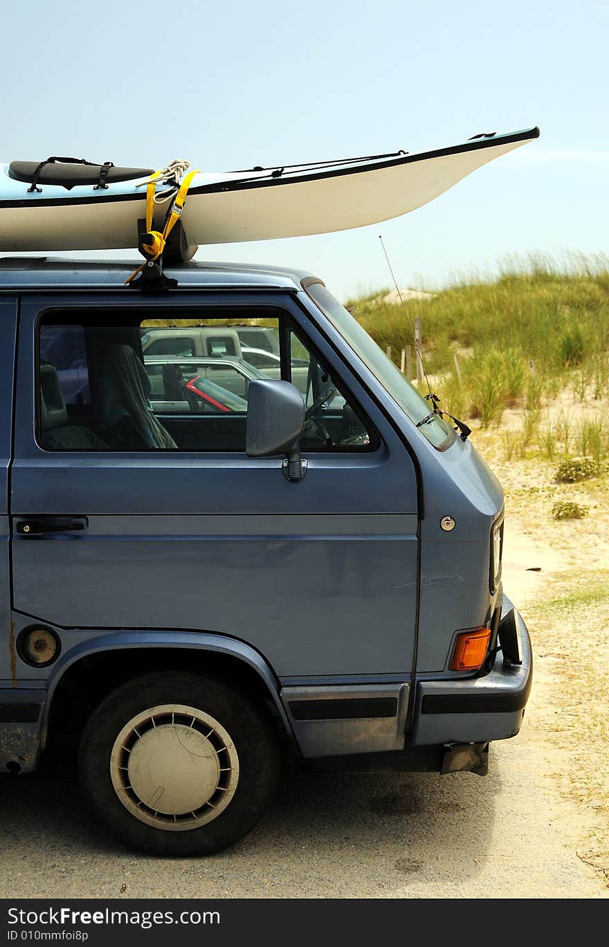 Old Volkswagen Bus With Surfboards