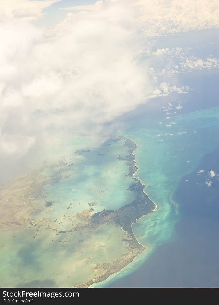 Colorful tropical islands and blue water from above. Colorful tropical islands and blue water from above