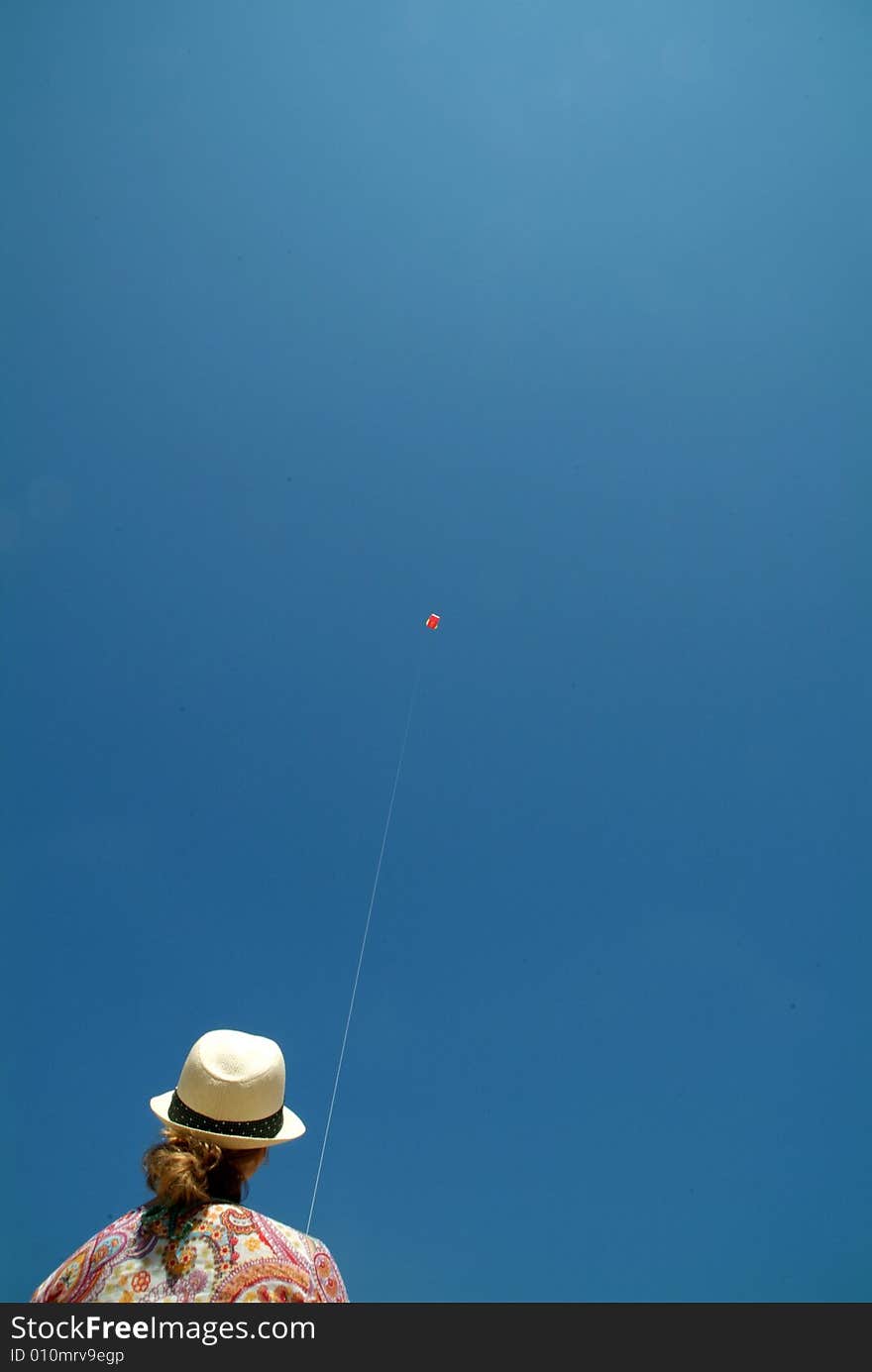 Girl flying kite