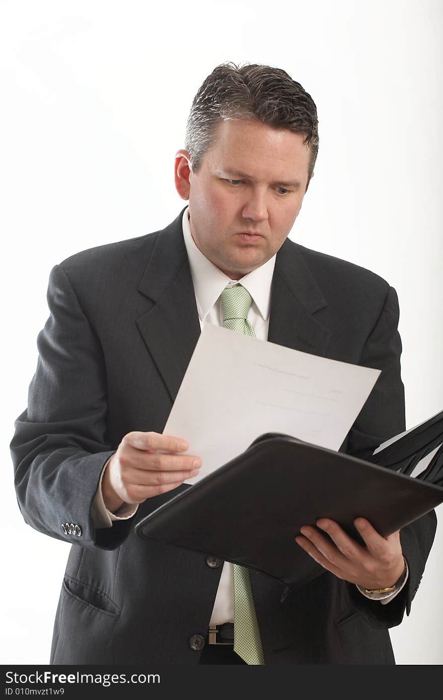 Businessman in suit multitasking on white background. Businessman in suit multitasking on white background