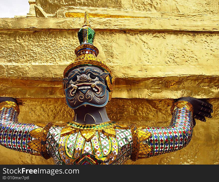 Detailed close-up of a siamese style statue at the Grand Palace and Wat Phra Kaew in Bangkok, Thailand. Detailed close-up of a siamese style statue at the Grand Palace and Wat Phra Kaew in Bangkok, Thailand