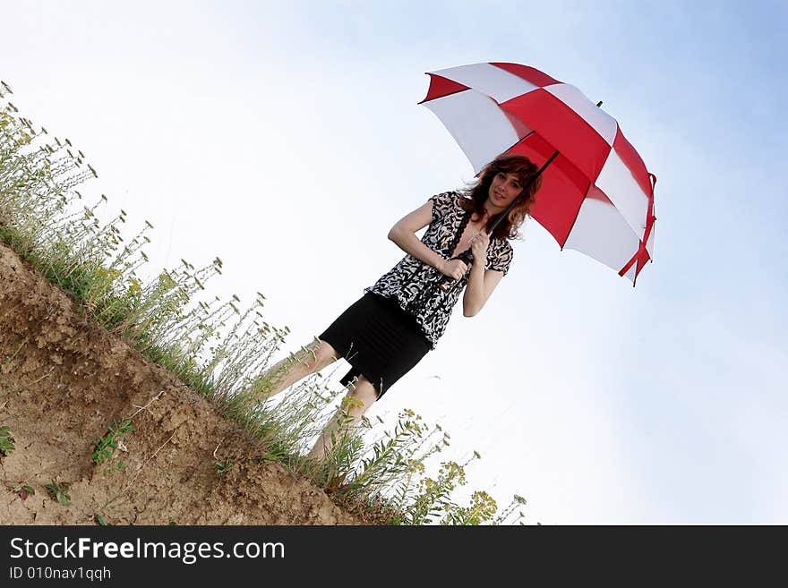 A beautiful girl and an umbrella. A beautiful girl and an umbrella