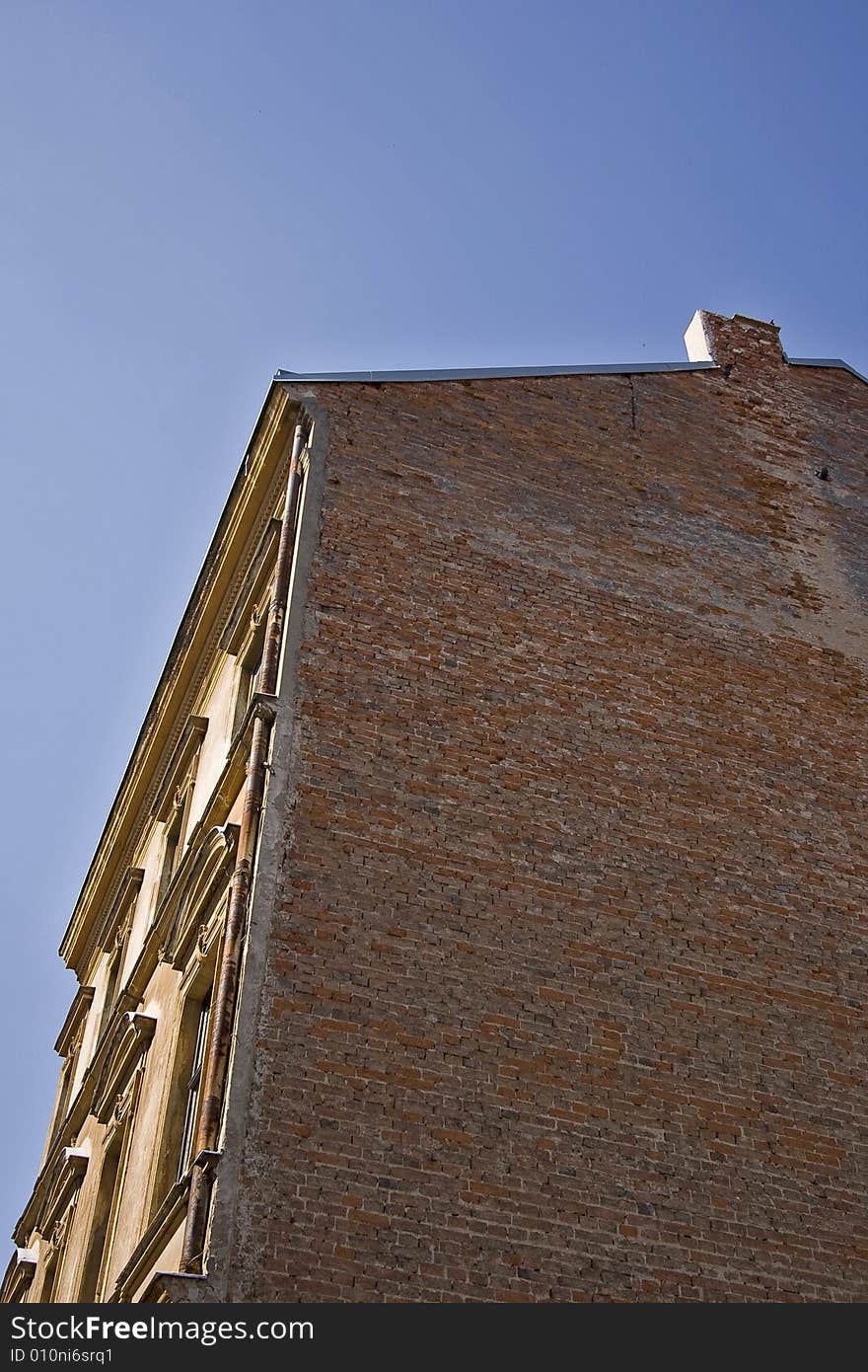 A brick wall in old town. A brick wall in old town.