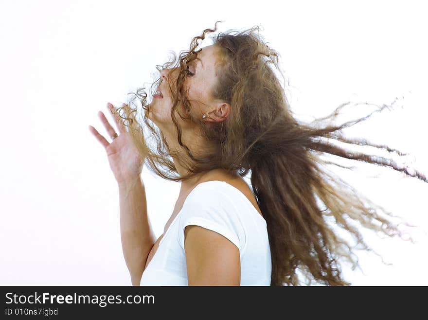 Stylish shot of nice young long hair woman on white back. Stylish shot of nice young long hair woman on white back