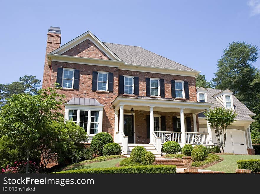 A nice traditonal two story brick home with a porch. A nice traditonal two story brick home with a porch