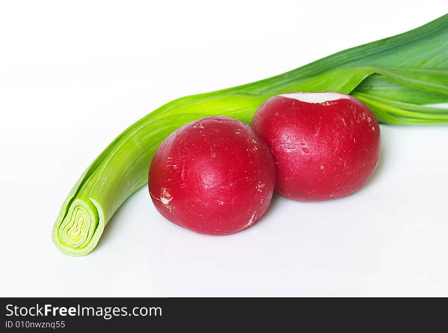 Scallion and radish isolated on the white background