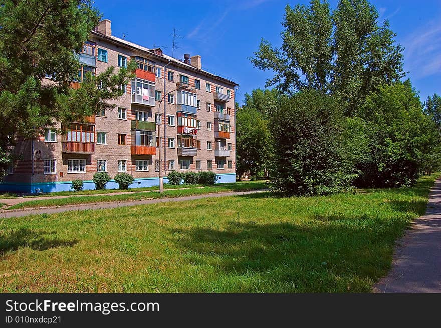 The house in city in summer day