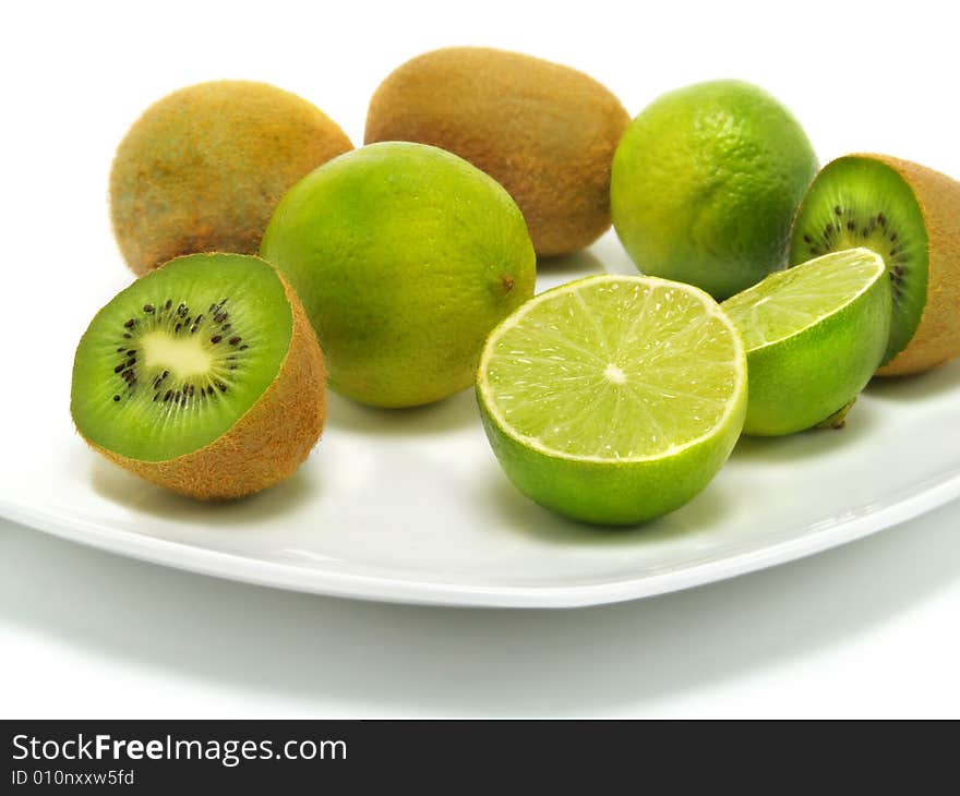 Fresh kiwis and ripe limes