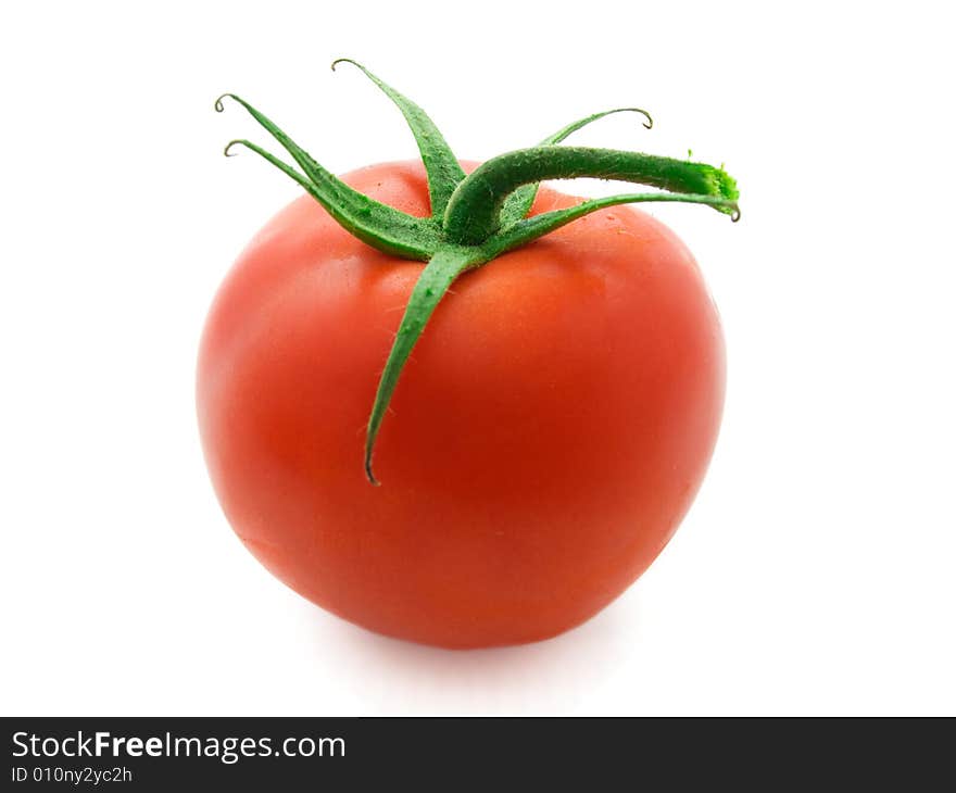 Red tomato isolated on white background.