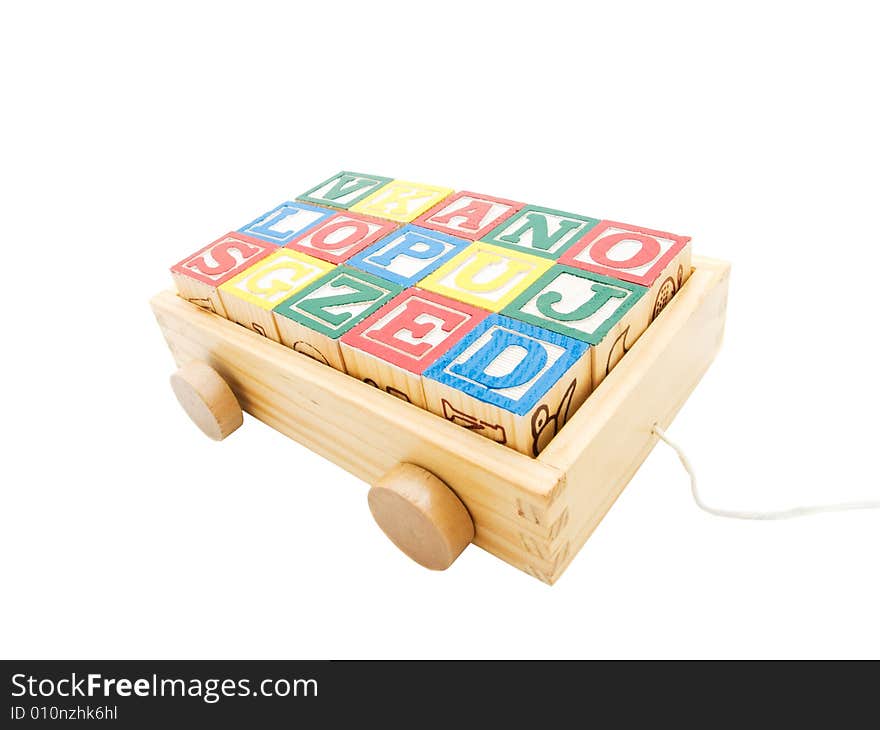 Words alphabet in the wooden carriage on the isolated white background. Words alphabet in the wooden carriage on the isolated white background.