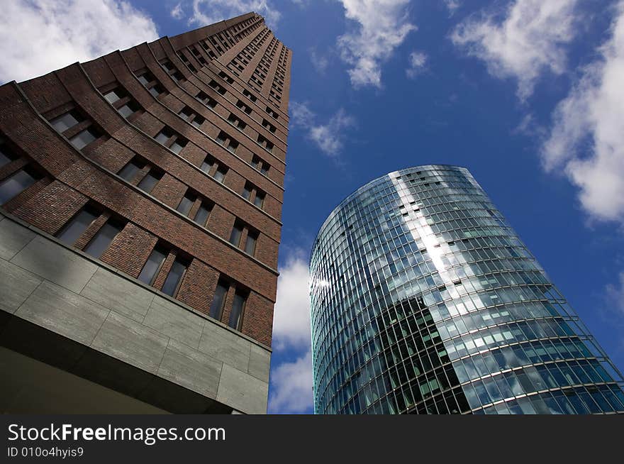 Futuristic Skyscrapers in Berlin, Germany and blue sky with clouds. Futuristic Skyscrapers in Berlin, Germany and blue sky with clouds