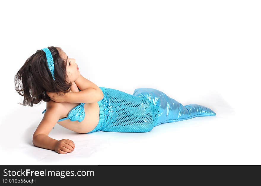 Little mermaid wearing a real mermaid costume perfect for photo manipulation.