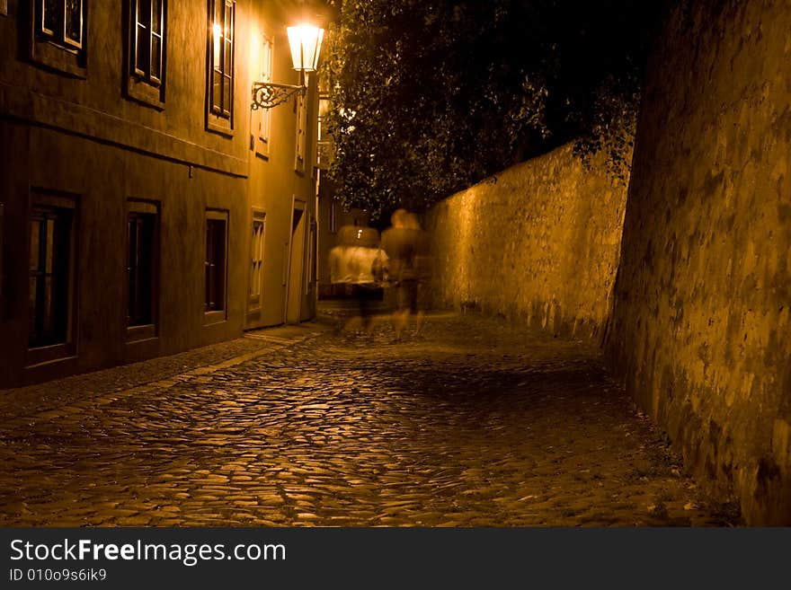 Night lane with couple on New World, on Hradcany in Prague. Night lane with couple on New World, on Hradcany in Prague.