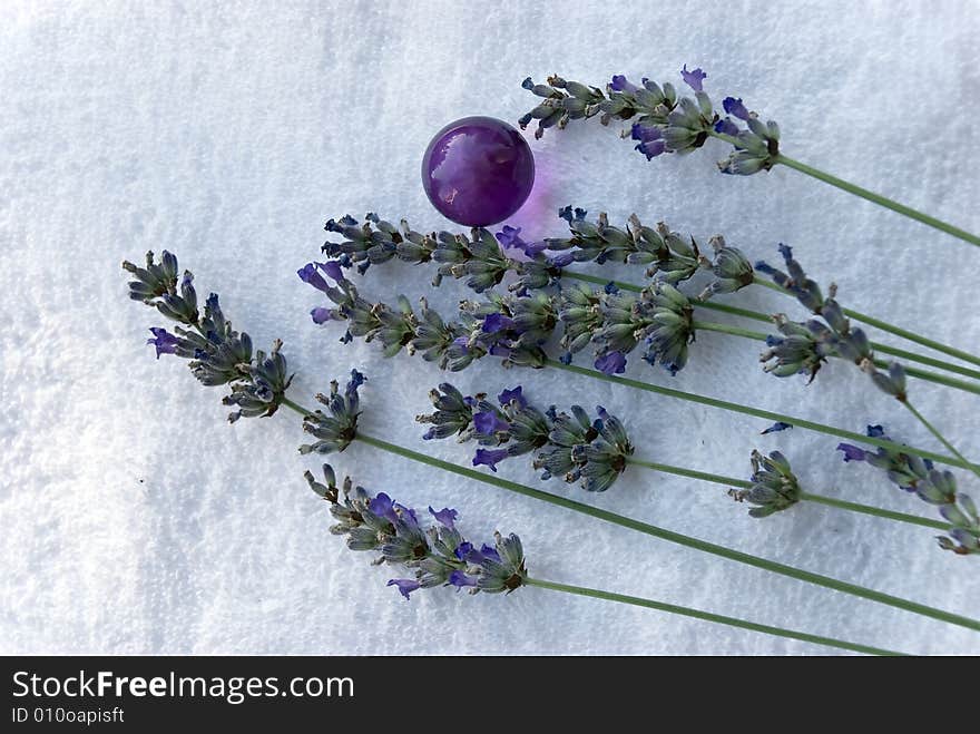 Lavander branch on the towel.