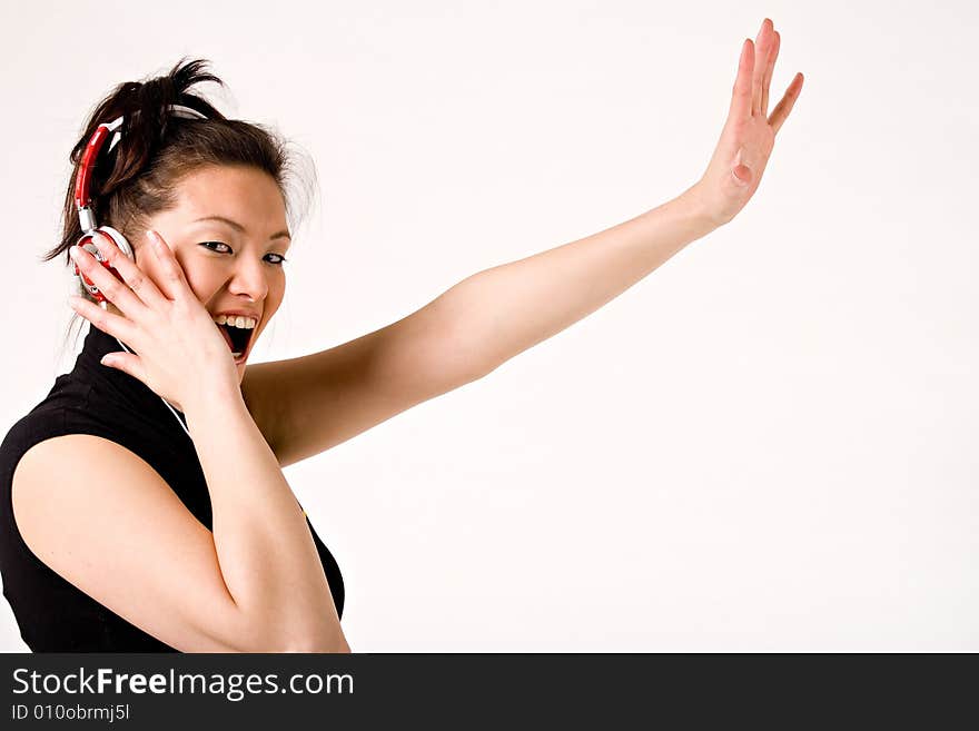 Young girl enjoying the music and dance on it. Young girl enjoying the music and dance on it