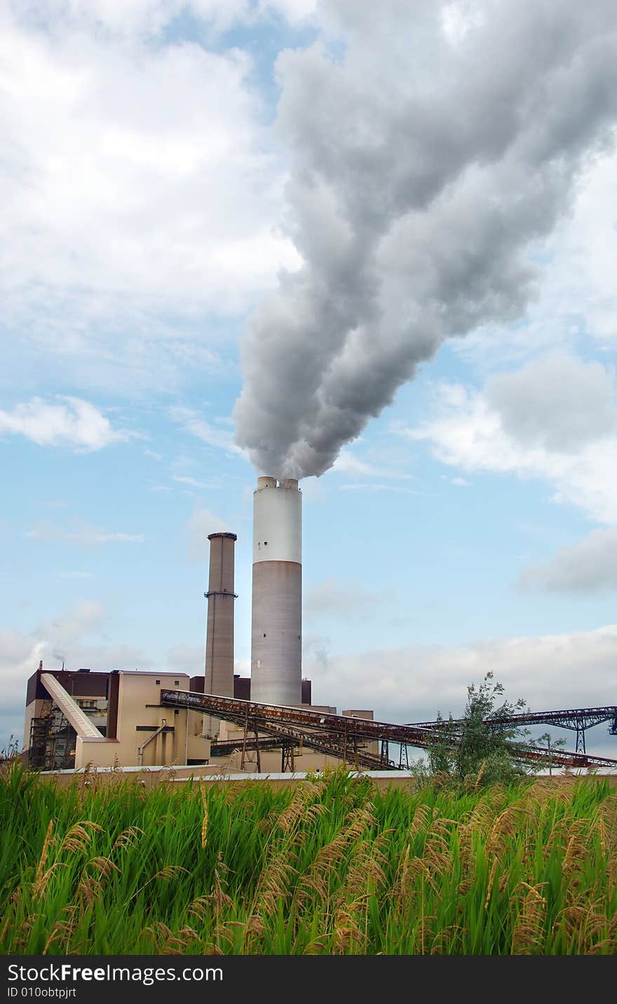 Smoke Billowing Out Of A Smoke Stack