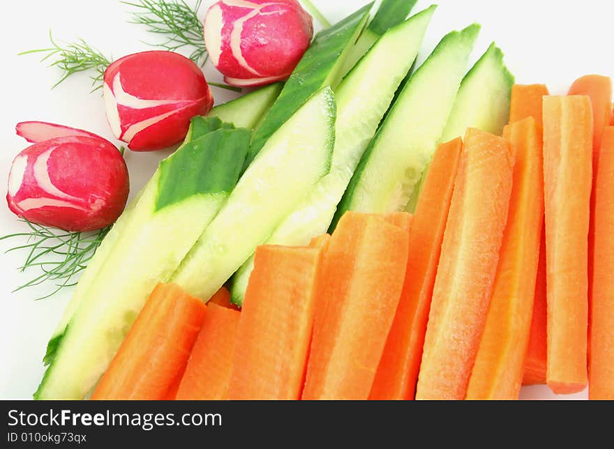 Radish, cucumbers and carrots assortment. Radish, cucumbers and carrots assortment