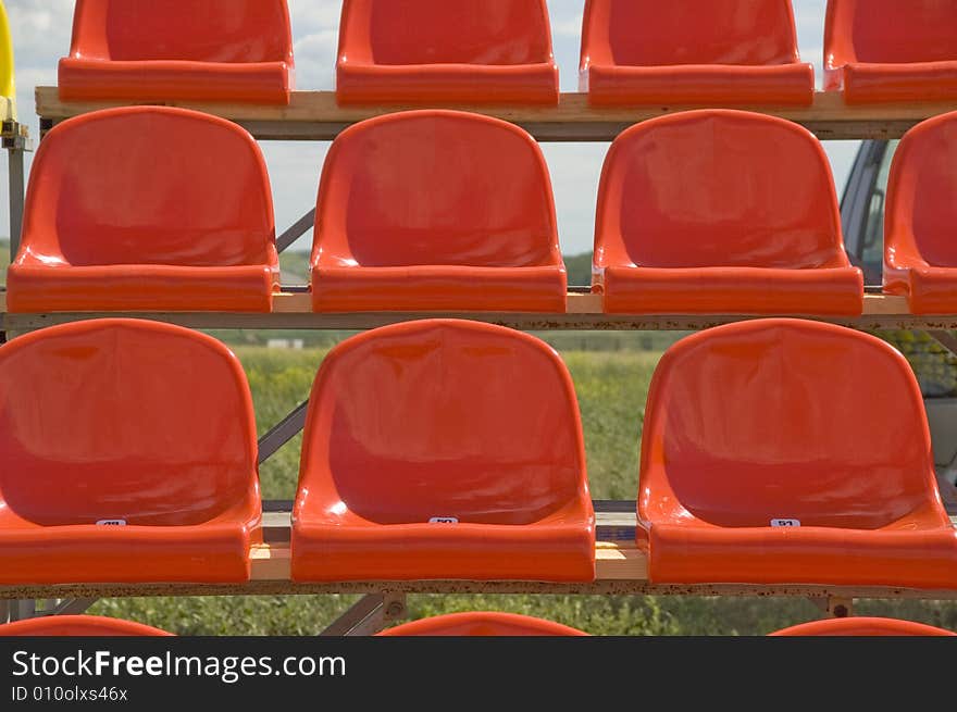 Lines of red seats. Red seats.