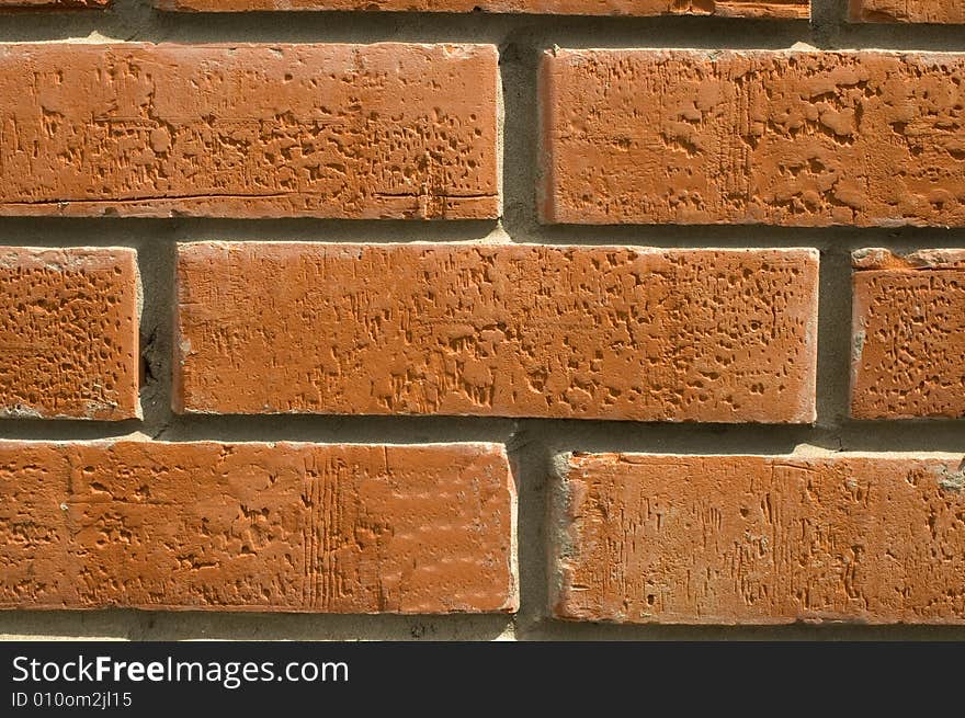 Wall  laid out by red bricks. Wall  laid out by red bricks.