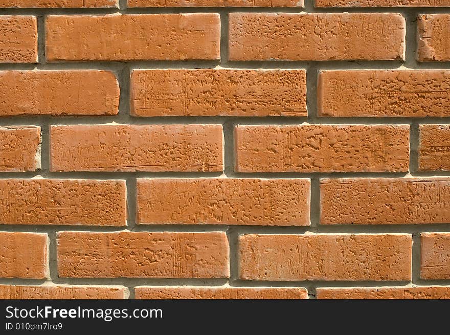 Wall  laid out by red bricks. Wall  laid out by red bricks.