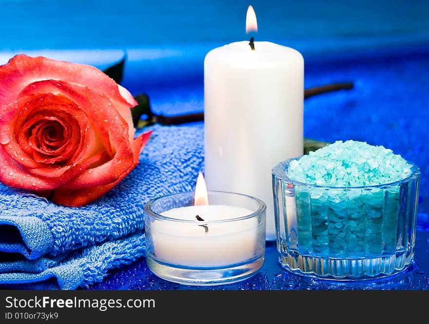 Spa essentials (candles, towel, salt and flower)