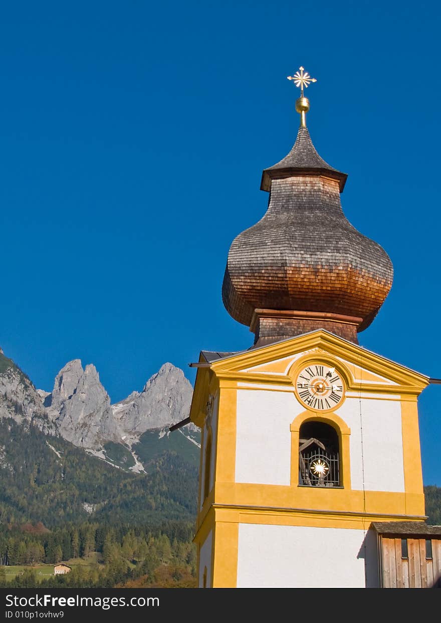 Tower of small church in the Alps