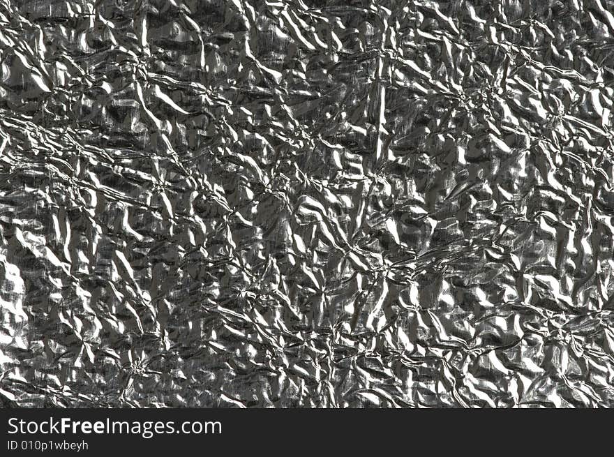 Background of textured uneven foil