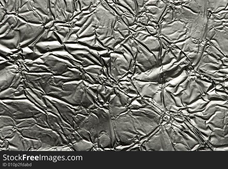 Background of textured uneven foil