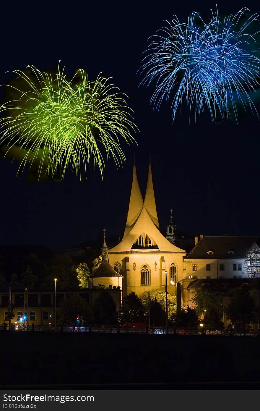 Monastery Emauzy (Emmaus)  in Prague with fireworks by night. Monastery Emauzy (Emmaus)  in Prague with fireworks by night