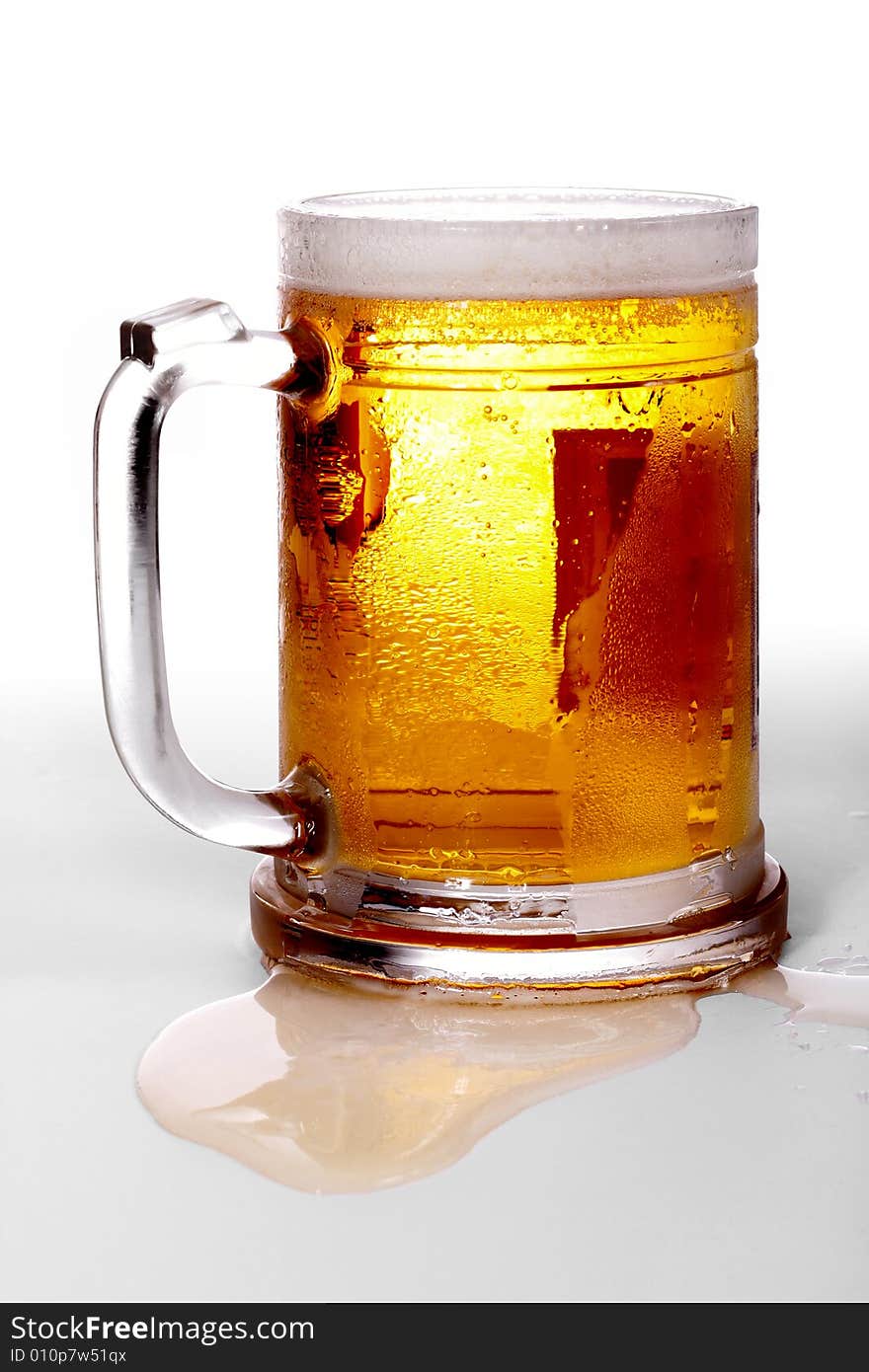 Glass of beer on the white background