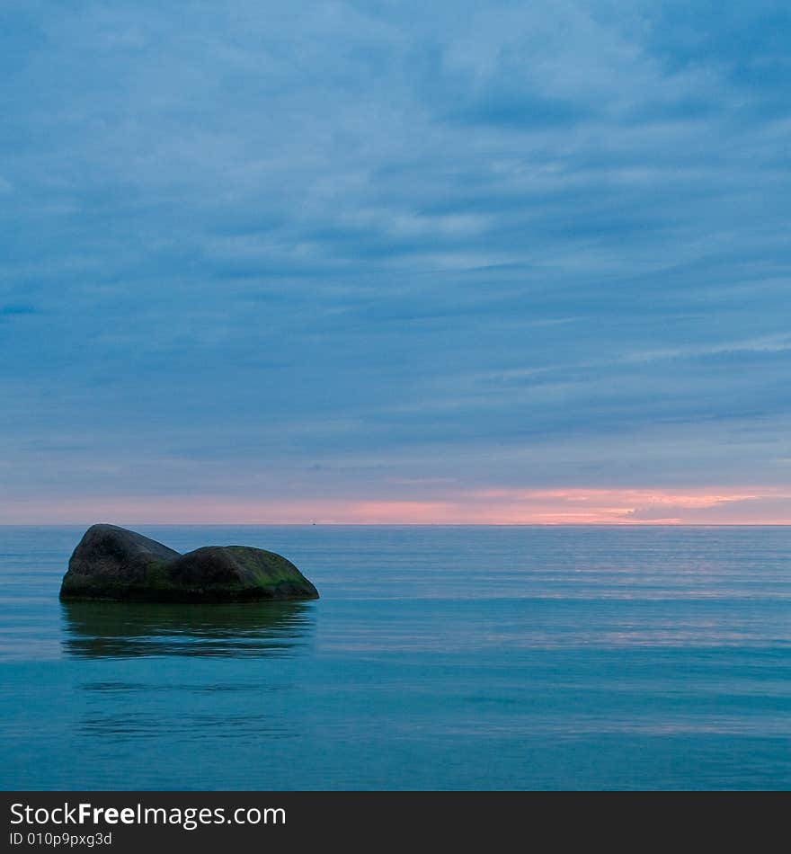 Two stones int the sea. Dusk. Two stones int the sea. Dusk.