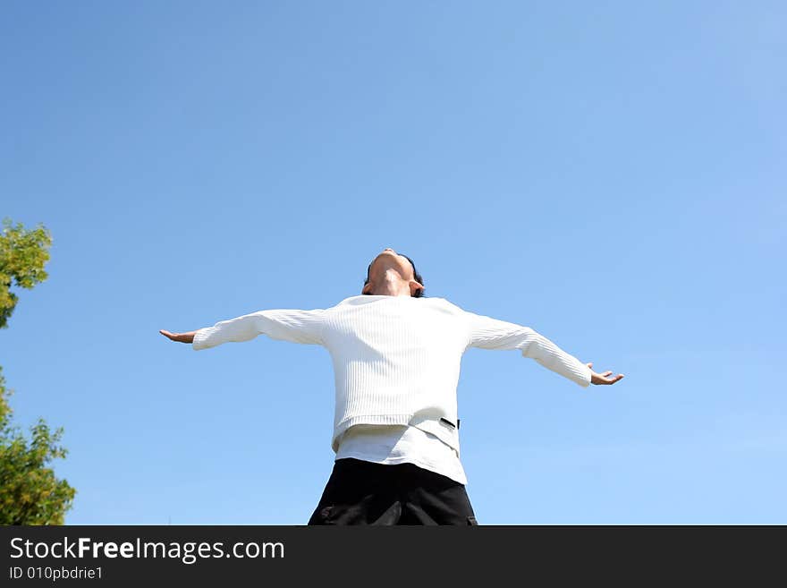 Man rise arm under hot tropical