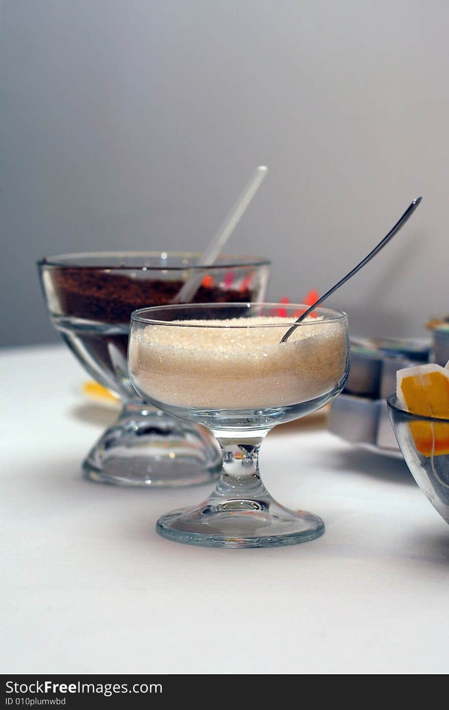 Glass sugar bowl on a table