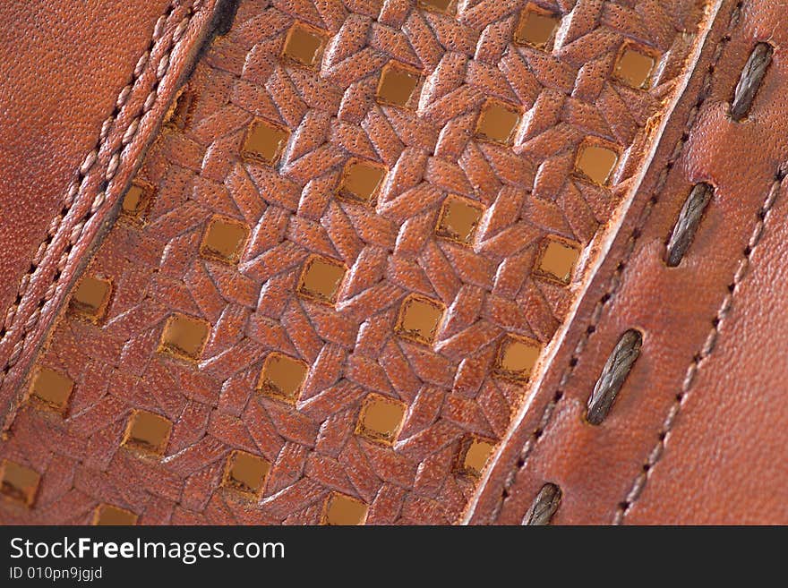 Multiwall leather with decorative sutures. Multiwall leather with decorative sutures