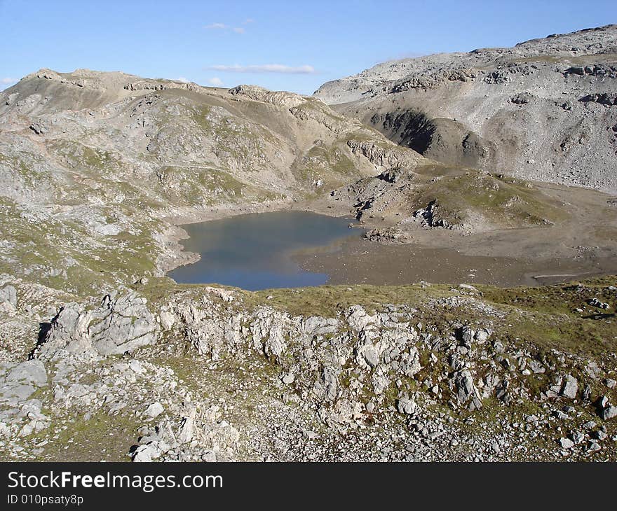 The Starkly Beautiful Lais Da Rims A Karst Lake In The Engadine Alps Canton Of Graubunden Switzerland. The Starkly Beautiful Lais Da Rims A Karst Lake In The Engadine Alps Canton Of Graubunden Switzerland.