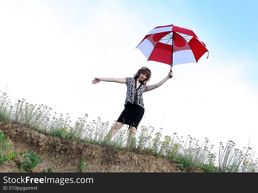 A beautiful girl and an umbrella. A beautiful girl and an umbrella