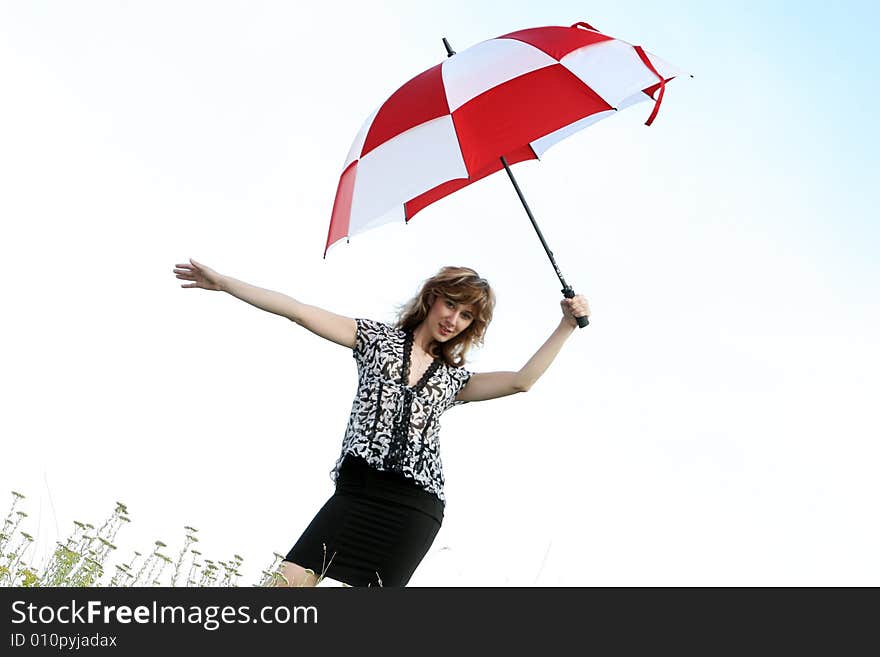 A beautiful girl and an umbrella. A beautiful girl and an umbrella