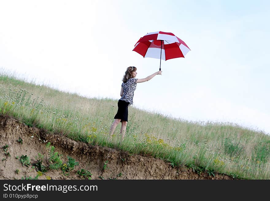 A beautiful girl and an umbrella. A beautiful girl and an umbrella