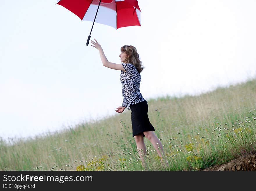 A beautiful girl and an umbrella. A beautiful girl and an umbrella