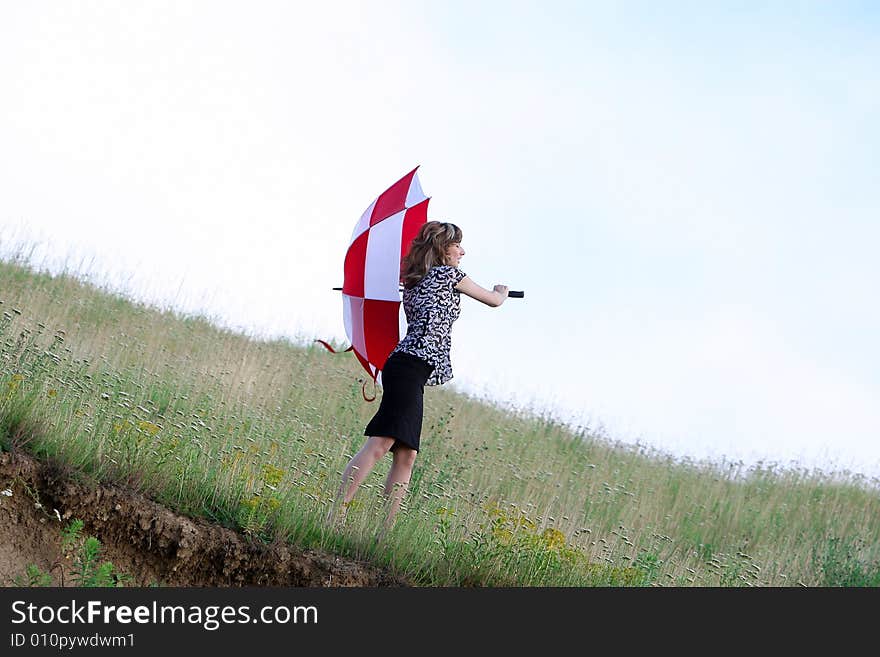 A beautiful girl and an umbrella. A beautiful girl and an umbrella