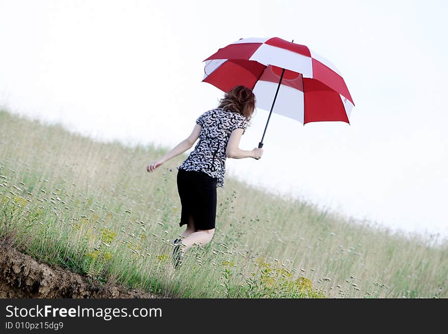 A beautiful girl and an umbrella. A beautiful girl and an umbrella