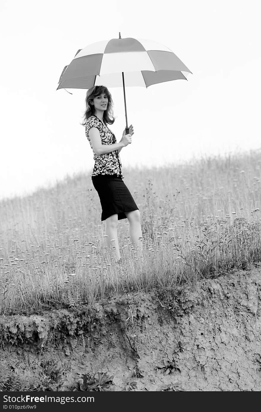 A beautiful girl and an umbrella. A beautiful girl and an umbrella