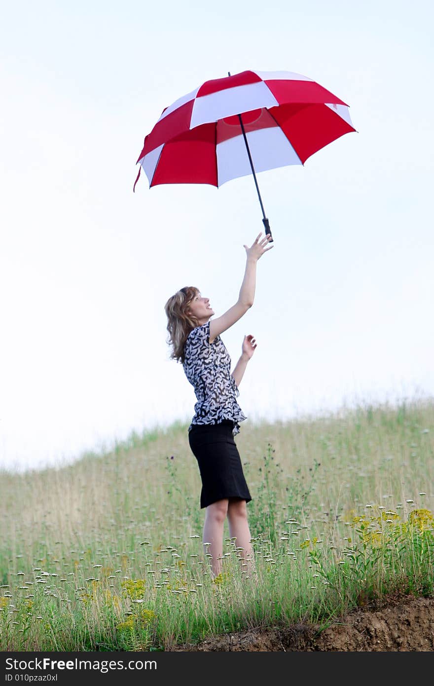 A beautiful girl and an umbrella. A beautiful girl and an umbrella