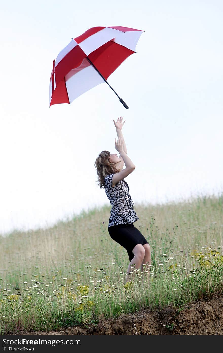 A beautiful girl and an umbrella. A beautiful girl and an umbrella