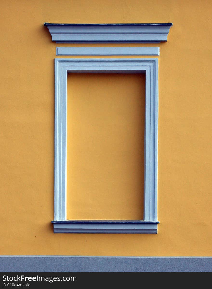 Blind and walled window of a house. Blind and walled window of a house.