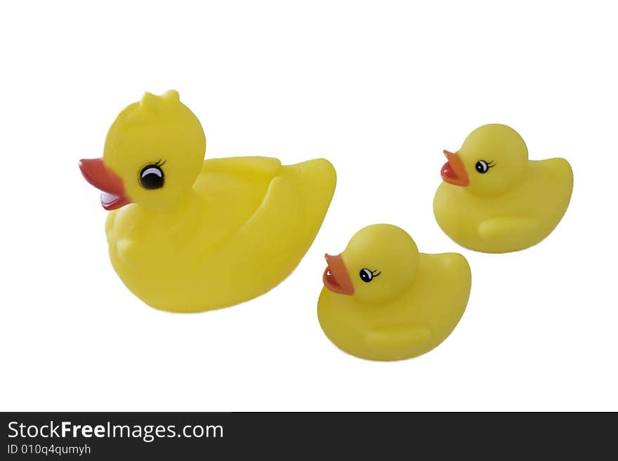 Three yellow rubber ducks isolated on white background. Three yellow rubber ducks isolated on white background