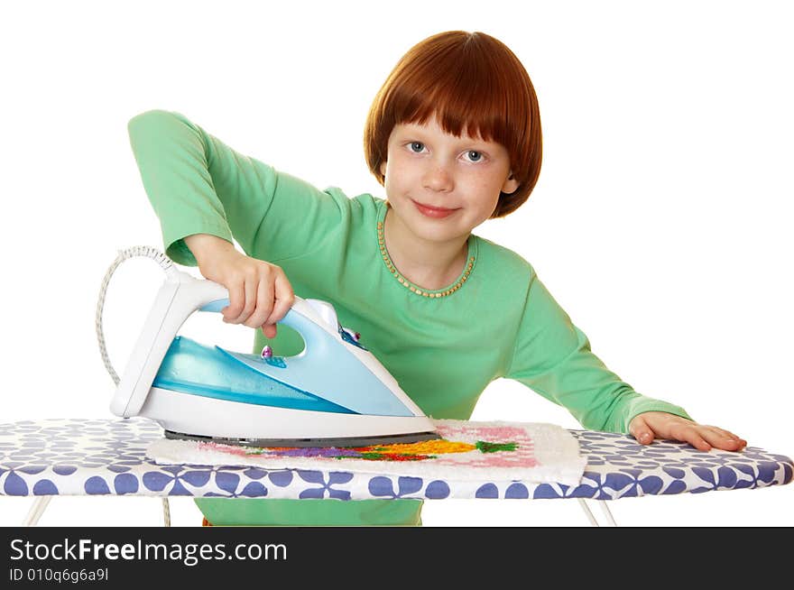 Children iron linen. Photo on a white background.