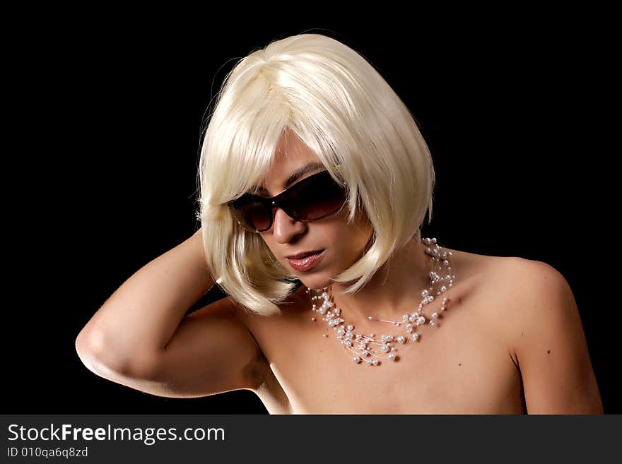 Gorgeous blond posing on black background