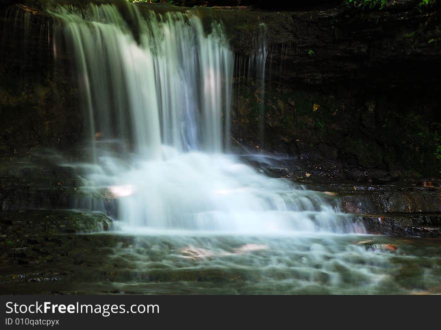 This is a small water fall, It steps down to the creek it feeds.