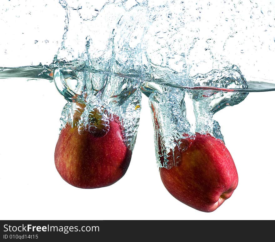 Apple in water. Photo on a white background.